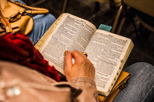 lady holding Bible