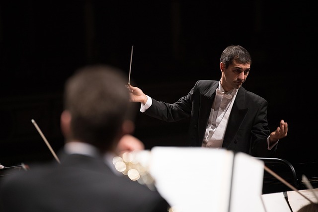 conductor leading an orchestra