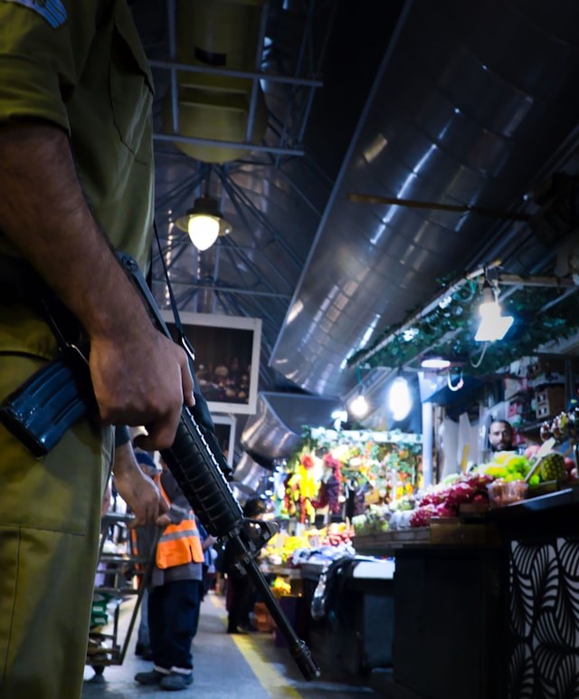 IDF soldier in marketplace