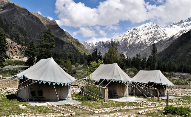 three rustic tents