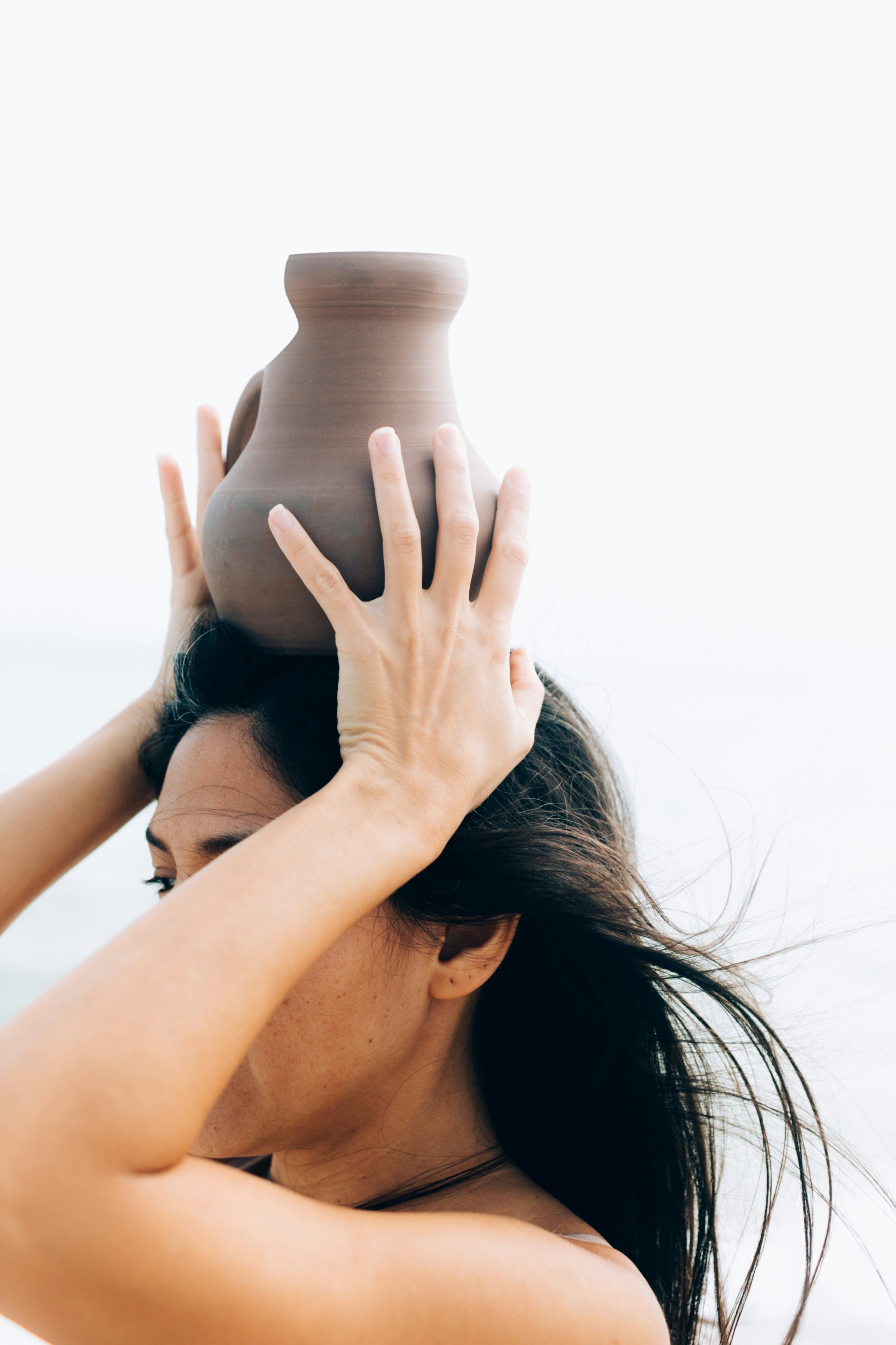 woman with jar on her head